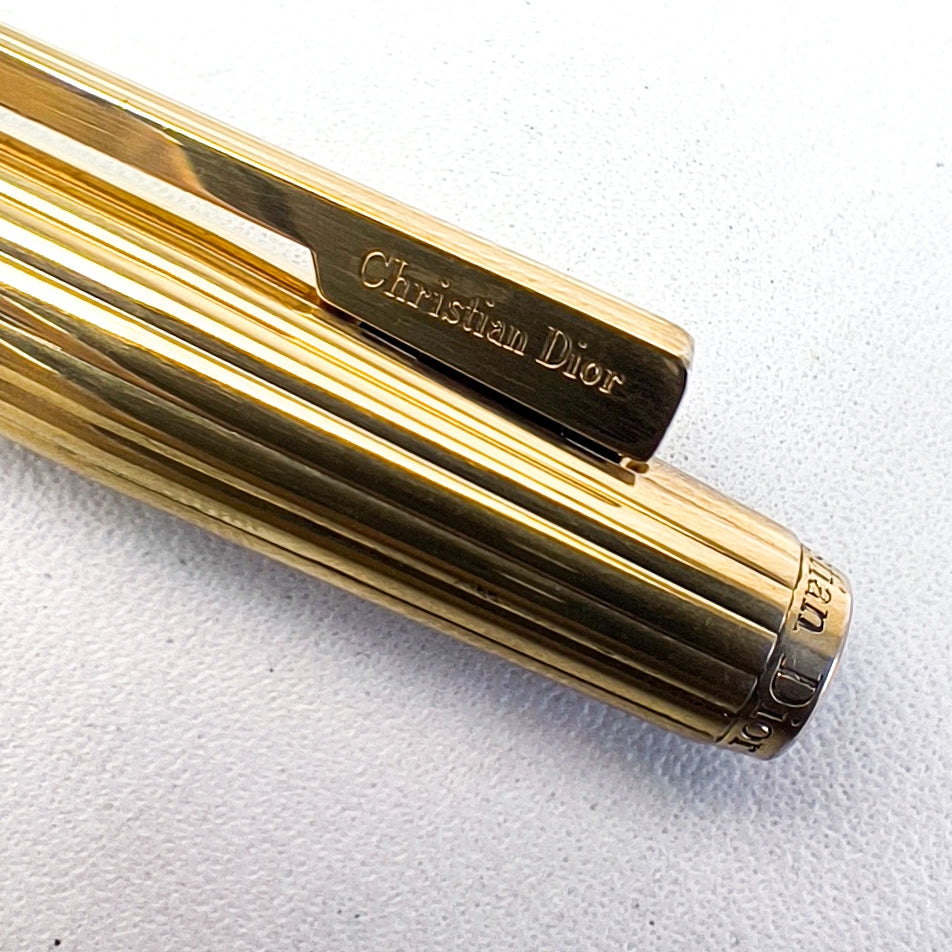 CHRISTIAN DIOR LOGO FLUTED GOLDPLATED FOUNTAIN PEN (1980s)
