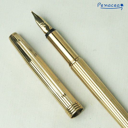 CHRISTIAN DIOR LOGO FLUTED GOLDPLATED FOUNTAIN PEN (1980s)